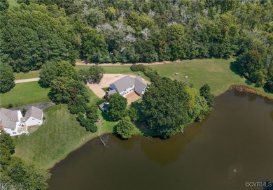 WATERFRONT PROPERTY. This exceptional colonial-style residence on Fort Lee Cardinal Golf Course in Virginia - for sale on GolfHomes.com, golf home, golf lot