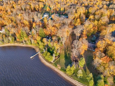 Experience refined modern living in this stunning 2025 on Indian Lake Golf and Country Club in Michigan - for sale on GolfHomes.com, golf home, golf lot