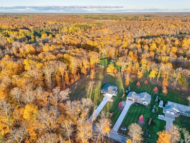 Experience refined modern living in this stunning 2025 on Indian Lake Golf and Country Club in Michigan - for sale on GolfHomes.com, golf home, golf lot