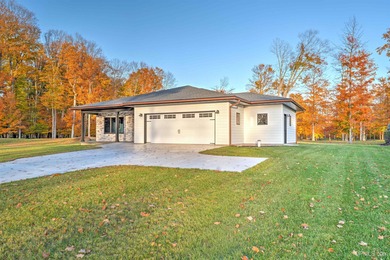 Experience refined modern living in this stunning 2025 on Indian Lake Golf and Country Club in Michigan - for sale on GolfHomes.com, golf home, golf lot