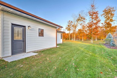Experience refined modern living in this stunning 2025 on Indian Lake Golf and Country Club in Michigan - for sale on GolfHomes.com, golf home, golf lot