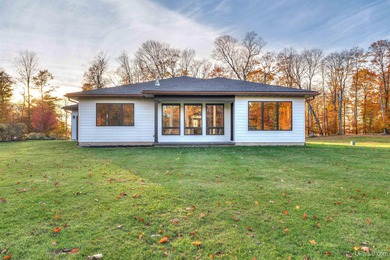 Experience refined modern living in this stunning 2025 on Indian Lake Golf and Country Club in Michigan - for sale on GolfHomes.com, golf home, golf lot