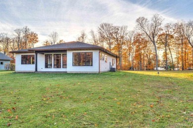 Experience refined modern living in this stunning 2025 on Indian Lake Golf and Country Club in Michigan - for sale on GolfHomes.com, golf home, golf lot