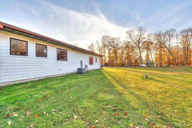 Experience refined modern living in this stunning 2025 on Indian Lake Golf and Country Club in Michigan - for sale on GolfHomes.com, golf home, golf lot