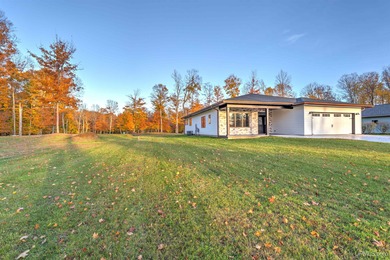 Experience refined modern living in this stunning 2025 on Indian Lake Golf and Country Club in Michigan - for sale on GolfHomes.com, golf home, golf lot