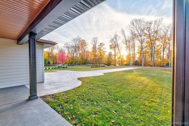 Experience refined modern living in this stunning 2025 on Indian Lake Golf and Country Club in Michigan - for sale on GolfHomes.com, golf home, golf lot