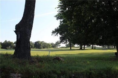 Tee Time is less than 5 minutes from your front door. This on Holiday Hills Resort and Golf in Missouri - for sale on GolfHomes.com, golf home, golf lot