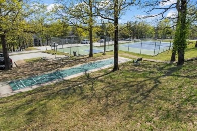 Tee Time is less than 5 minutes from your front door. This on Holiday Hills Resort and Golf in Missouri - for sale on GolfHomes.com, golf home, golf lot