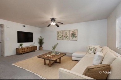 Welcome to this well-maintained lower-level condo located on the on The Oasis Golf Club in Nevada - for sale on GolfHomes.com, golf home, golf lot