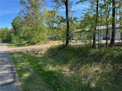 Premium wooded lot at the prestigious Izatys Golf  Yacht Club on Izatys Golf and Yacht Club in Minnesota - for sale on GolfHomes.com, golf home, golf lot
