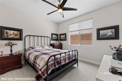 Set against the scenic backdrop of a manicured golf course, this on Conestoga Golf Club in Nevada - for sale on GolfHomes.com, golf home, golf lot