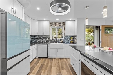 Beautifully redesigned for modern island living and effortless on Waikoloa Village Golf Club in Hawaii - for sale on GolfHomes.com, golf home, golf lot