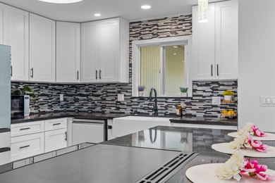 Beautifully redesigned for modern island living and effortless on Waikoloa Village Golf Club in Hawaii - for sale on GolfHomes.com, golf home, golf lot