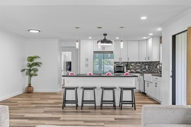 Beautifully redesigned for modern island living and effortless on Waikoloa Village Golf Club in Hawaii - for sale on GolfHomes.com, golf home, golf lot