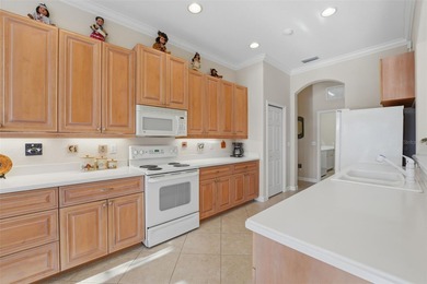 This beautiful Correggio model home is built by WCI who is known on Venetian Golf and River Club in Florida - for sale on GolfHomes.com, golf home, golf lot