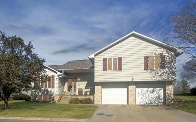 Welcome home to 725 Carol Dr. This charming multi~level family on The Meadows Country Club in Iowa - for sale on GolfHomes.com, golf home, golf lot