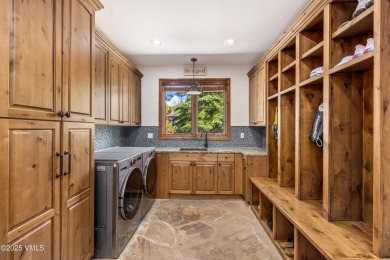 This custom-built, 5-bedroom single family home with separate on Sonnenalp Golf Club in Colorado - for sale on GolfHomes.com, golf home, golf lot