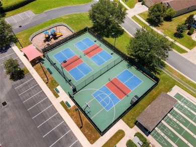 STUNNING 3-BEDROOM HOME WITH GOLF COURSE VIEWS & EXTENSIVE on Summerglen Country Club in Florida - for sale on GolfHomes.com, golf home, golf lot