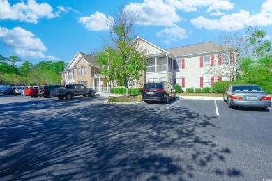 Fantastic opportunity to own this spacious first-floor end-unit on International Club of Myrtle Beach in South Carolina - for sale on GolfHomes.com, golf home, golf lot