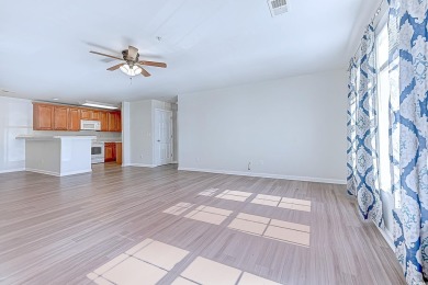 Fantastic opportunity to own this spacious first-floor end-unit on International Club of Myrtle Beach in South Carolina - for sale on GolfHomes.com, golf home, golf lot