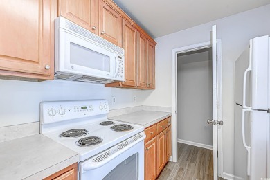 Fantastic opportunity to own this spacious first-floor end-unit on International Club of Myrtle Beach in South Carolina - for sale on GolfHomes.com, golf home, golf lot