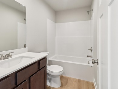 Step into Modern Elegance at Spring Meadows! This beautiful on Sugar Creek Golf Course in Iowa - for sale on GolfHomes.com, golf home, golf lot