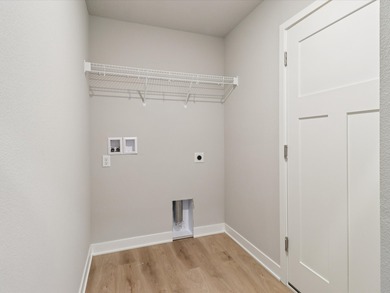 Step into Modern Elegance at Spring Meadows! This beautiful on Sugar Creek Golf Course in Iowa - for sale on GolfHomes.com, golf home, golf lot