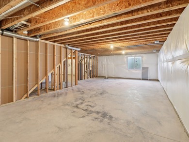 Step into Modern Elegance at Spring Meadows! This beautiful on Sugar Creek Golf Course in Iowa - for sale on GolfHomes.com, golf home, golf lot