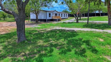 2025 Premier Clayton Home in Gated Lake Nocona Community on Nocona Hills Golf Course in Texas - for sale on GolfHomes.com, golf home, golf lot