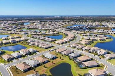 Don't miss this rare chance to own a move-in ready jewel in the on Esplanade Golf and Country at Lakewood Ranch in Florida - for sale on GolfHomes.com, golf home, golf lot