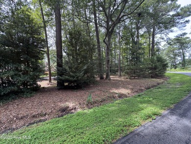 This beautiful lot in Carolina Shores is nearly 1/2 acre in size on Carolina Shores Golf Course in North Carolina - for sale on GolfHomes.com, golf home, golf lot