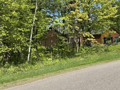 Premium wooded lot at the prestigious Izatys Golf  Yacht Club on Izatys Golf and Yacht Club in Minnesota - for sale on GolfHomes.com, golf home, golf lot