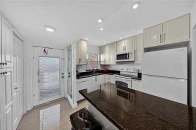 Welcome to this spacious and fully furnished 2-bedroom, 2-bath on Sunrise Lakes Phase III in Florida - for sale on GolfHomes.com, golf home, golf lot