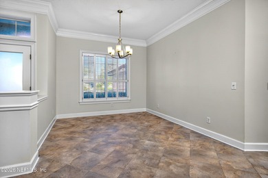 Discover refined luxury in the exclusive gated community of on Jacksonville Golf and Country Club in Florida - for sale on GolfHomes.com, golf home, golf lot