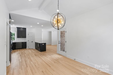 Welcome to this beautifully updated 3-bedroom, 2-bath brick on Mallard Head Country Club in North Carolina - for sale on GolfHomes.com, golf home, golf lot