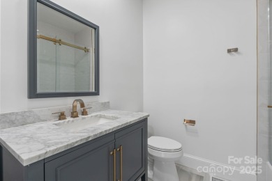 Welcome to this beautifully updated 3-bedroom, 2-bath brick on Mallard Head Country Club in North Carolina - for sale on GolfHomes.com, golf home, golf lot