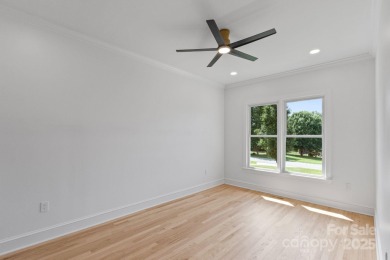 Welcome to this beautifully updated 3-bedroom, 2-bath brick on Mallard Head Country Club in North Carolina - for sale on GolfHomes.com, golf home, golf lot