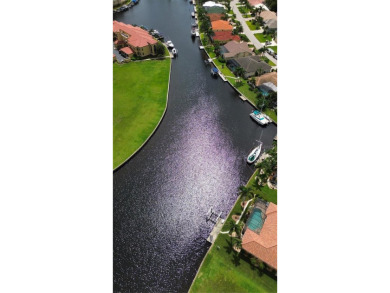 Prime Waterfront Lot with Expansive Canal View.. Discover an on Saint Andrews South Golf Club in Florida - for sale on GolfHomes.com, golf home, golf lot