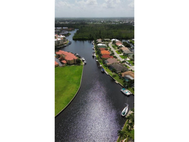 Prime Waterfront Lot with Expansive Canal View.. Discover an on Saint Andrews South Golf Club in Florida - for sale on GolfHomes.com, golf home, golf lot