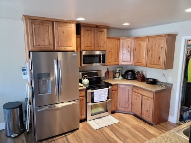 Live where comfort meets golf course views! This 4-bedroom on Toana Vista Golf Course in Nevada - for sale on GolfHomes.com, golf home, golf lot