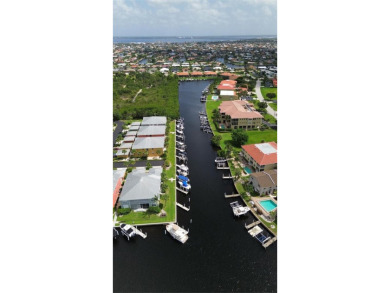 Prime Waterfront Lot with Expansive Canal View.. Discover an on Saint Andrews South Golf Club in Florida - for sale on GolfHomes.com, golf home, golf lot