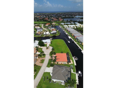 Prime Waterfront Lot with Expansive Canal View.. Discover an on Saint Andrews South Golf Club in Florida - for sale on GolfHomes.com, golf home, golf lot