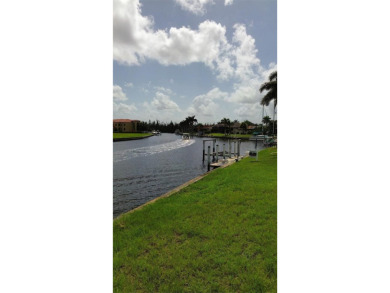 Prime Waterfront Lot with Expansive Canal View.. Discover an on Saint Andrews South Golf Club in Florida - for sale on GolfHomes.com, golf home, golf lot