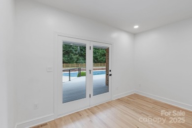 Welcome to this beautifully updated 3-bedroom, 2-bath brick on Mallard Head Country Club in North Carolina - for sale on GolfHomes.com, golf home, golf lot