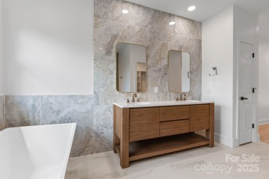 Welcome to this beautifully updated 3-bedroom, 2-bath brick on Mallard Head Country Club in North Carolina - for sale on GolfHomes.com, golf home, golf lot