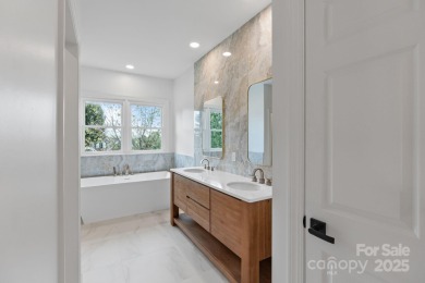 Welcome to this beautifully updated 3-bedroom, 2-bath brick on Mallard Head Country Club in North Carolina - for sale on GolfHomes.com, golf home, golf lot