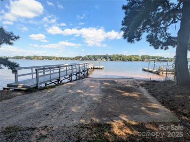 Welcome to this beautifully updated 3-bedroom, 2-bath brick on Mallard Head Country Club in North Carolina - for sale on GolfHomes.com, golf home, golf lot