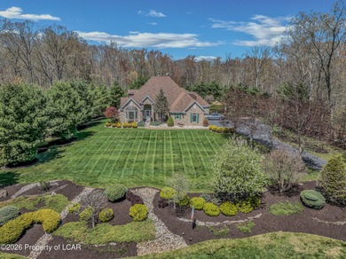 Private tree-lined driveway leads to this stunning 5 bedroom 6 on Blue Ridge Trail Golf Club in Pennsylvania - for sale on GolfHomes.com, golf home, golf lot