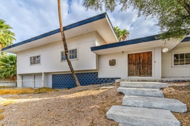 Attention Investors! This property is a complete fixer-upper on Las Vegas National Golf Club in Nevada - for sale on GolfHomes.com, golf home, golf lot