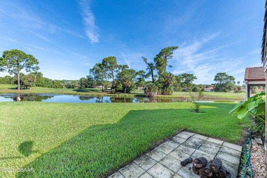 Enjoy stunning water views of the golf course from the back on The Club At Pelican Bay - North Course in Florida - for sale on GolfHomes.com, golf home, golf lot